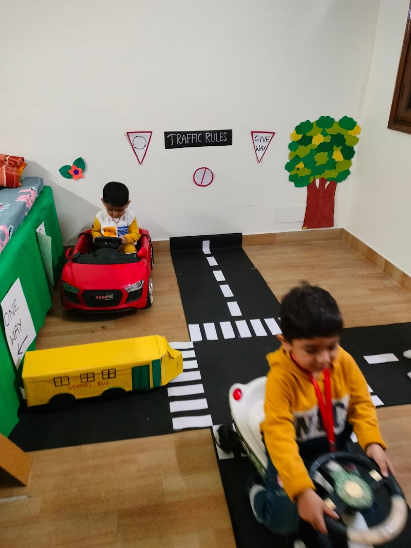 Kids learning traffic rules with ride-on cars